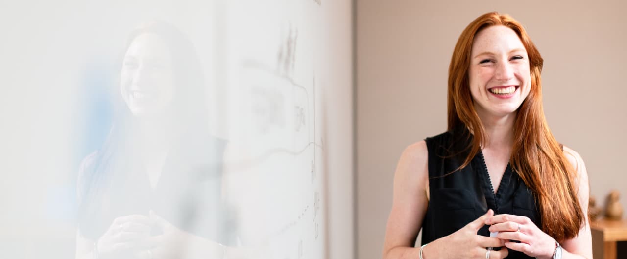 Teacher smiling in classroom
