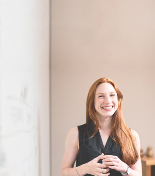 Teacher smiling in classroom